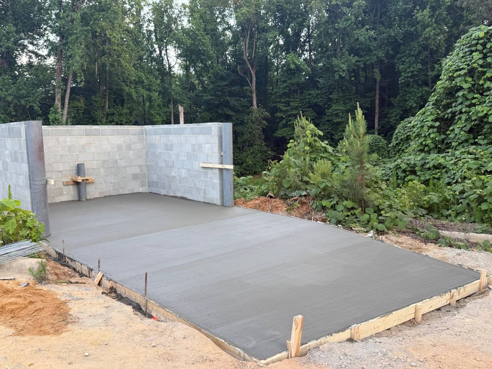 Fresh garage slab pour with forms still in place